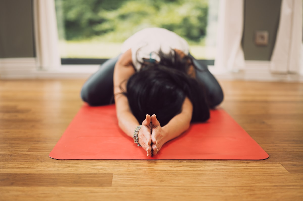 Man performing stretching exercise for flexibility